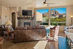 The living area has charming southwestern inspired interiors and stunning Sedona red rock views